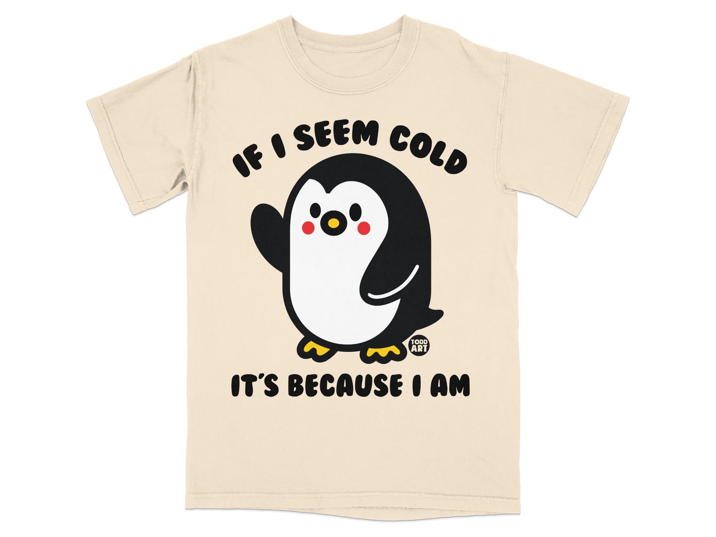 Cream t-shirt with a cute cartoon penguin waving and text "If I seem cold, it's because I am".