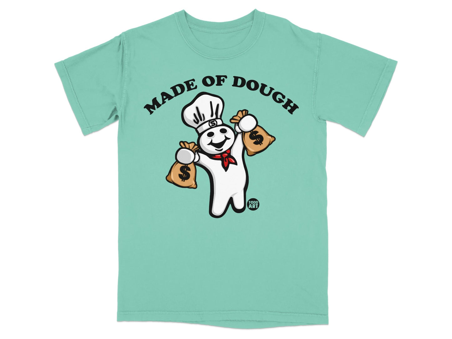 Green t-shirt with a cartoon Pillsbury Doughboy holding money bags, text reads "Made of Dough".