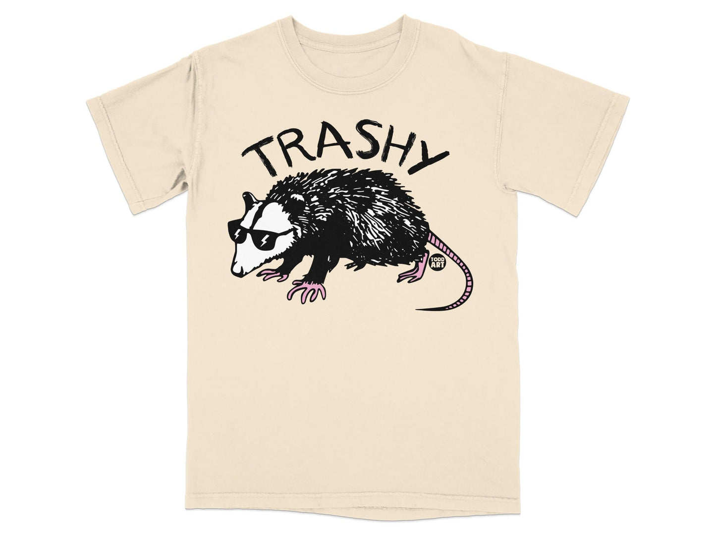 Cream t-shirt with black graphic of a trash panda wearing sunglasses.