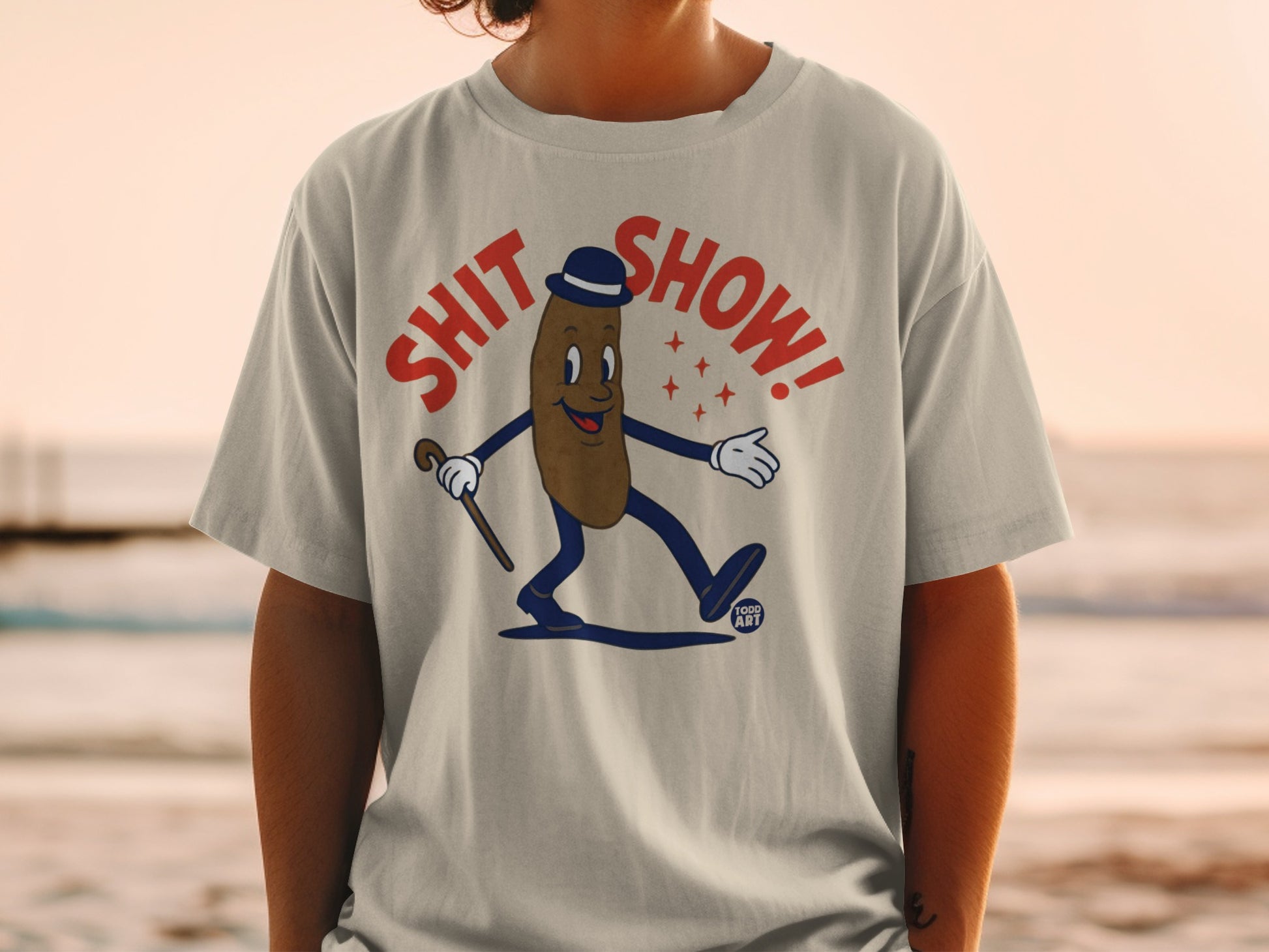 Cartoon character with cane and hat, "SHIT SHOW!" text.