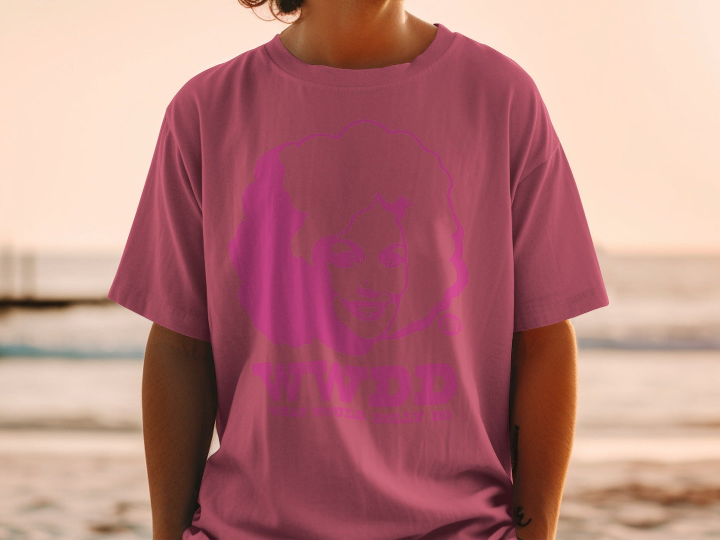 Fuchsia t-shirt featuring a bold pink graphic of a person's face and the word "TRIED"