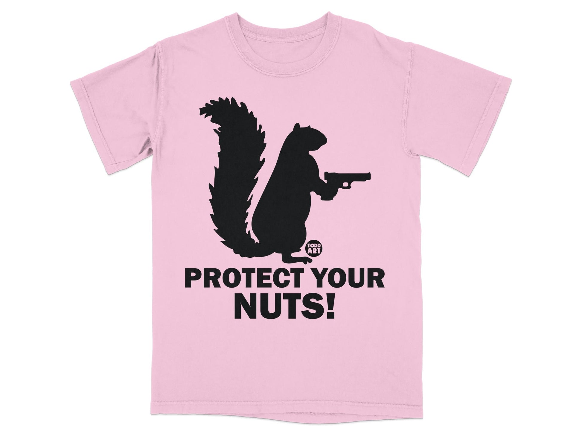 Pink t-shirt with black squirrel silhouette holding a gun and "PROTECT YOUR NUTS!" text.