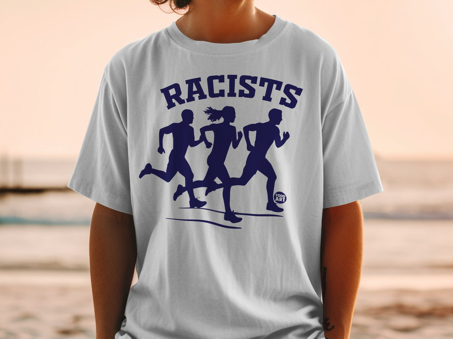 White t-shirt with blue graphic of three running figures and "RACISTS" text.