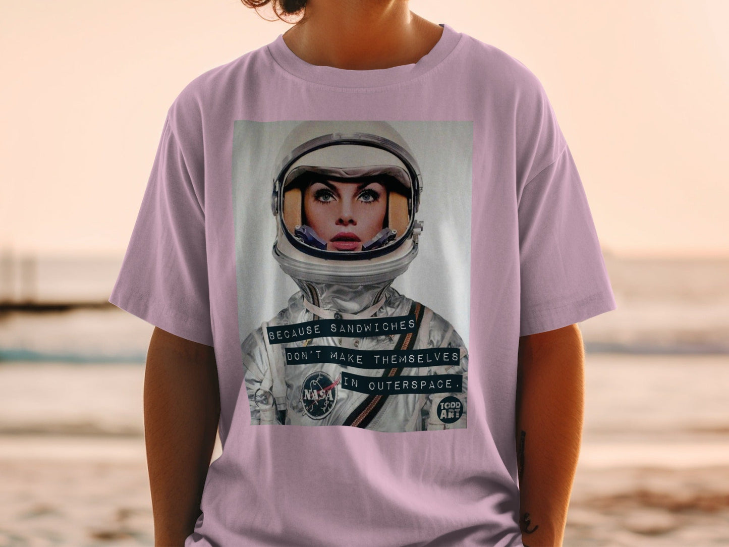 Astronaut wearing a NASA helmet with text "Because sandwiches don't make themselves in outer space."