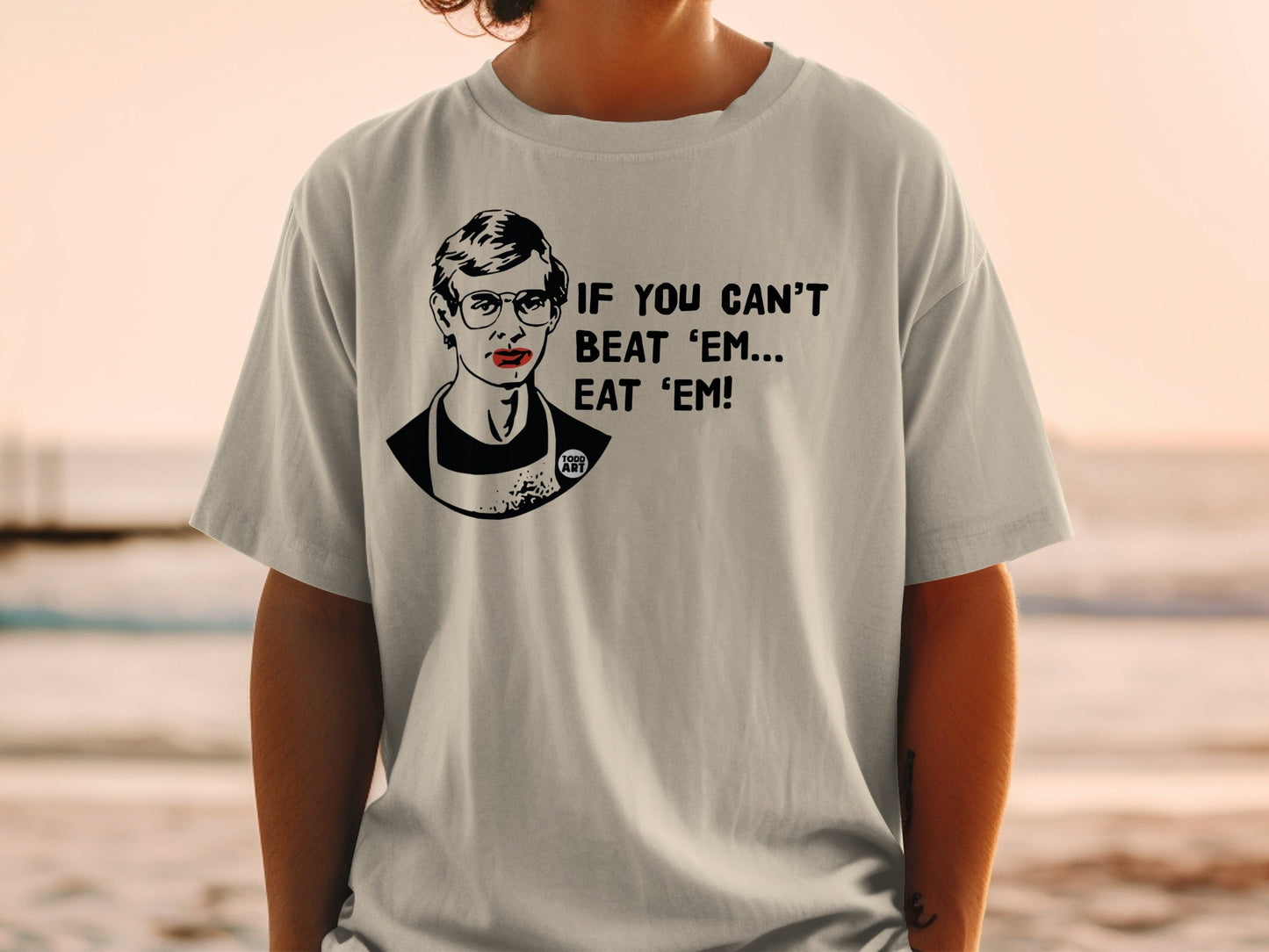 Light gray t-shirt with black and red graphic of Ruth Bader Ginsburg and text.
