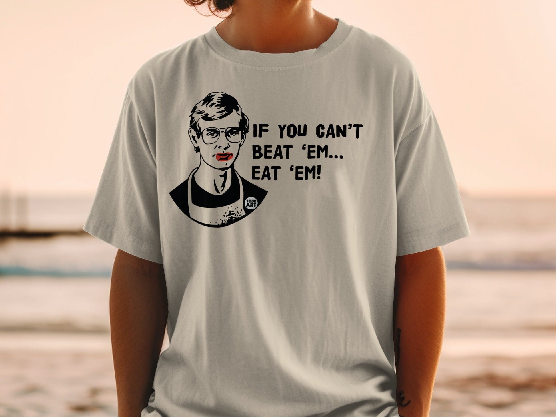 Light gray t-shirt with black and red graphic of Ruth Bader Ginsburg and text.