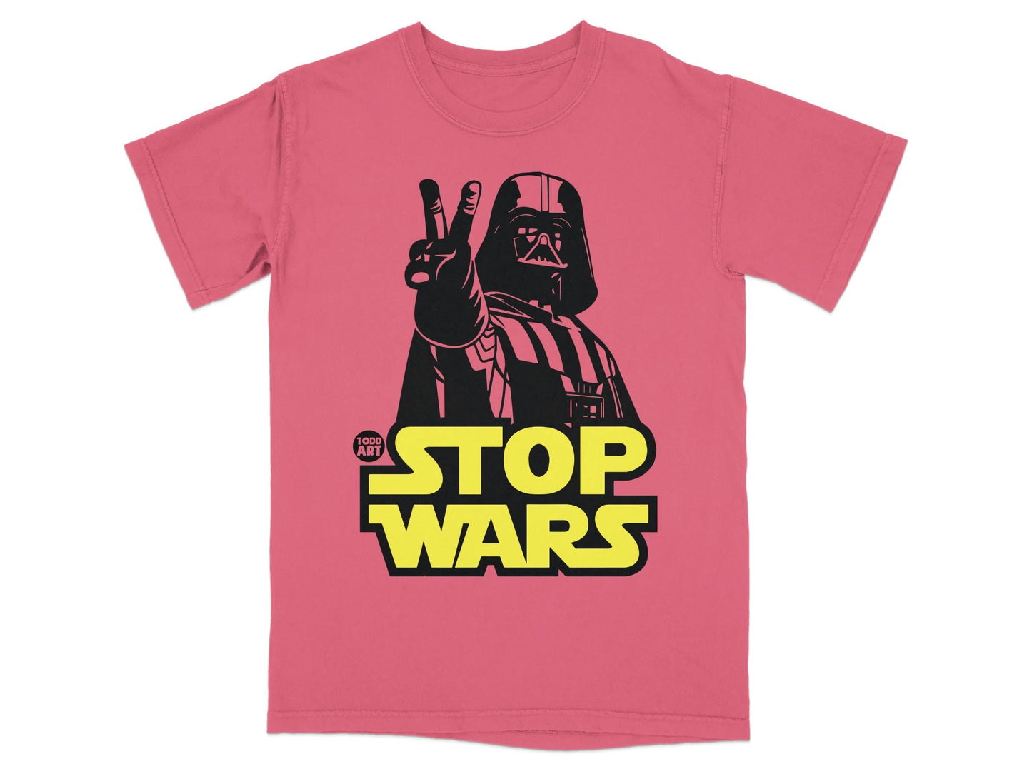 Darth Vader giving a peace sign on a pink t-shirt with "Stop Wars" text.