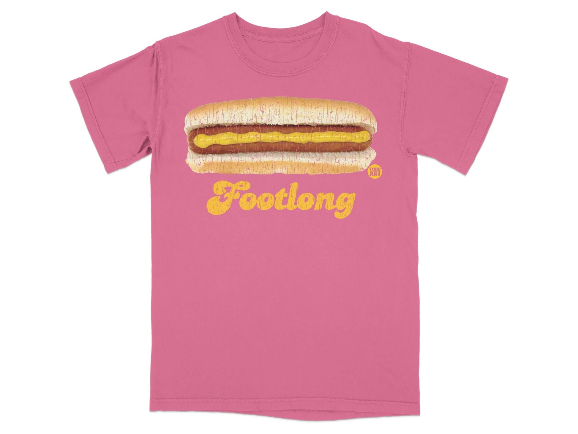 Pink t-shirt with "Footlong" text and a hot dog with mustard graphic.