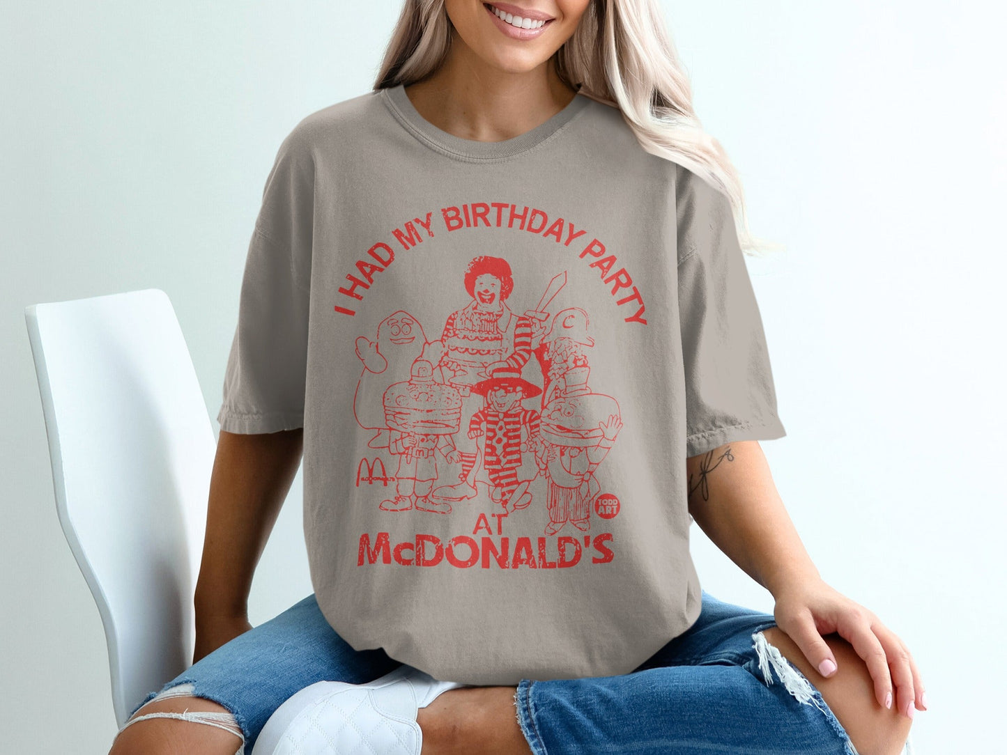 T-shirt with graphic of McDonald's characters and "I HAD MY BIRTHDAY PARTY AT MCDONALD'S".