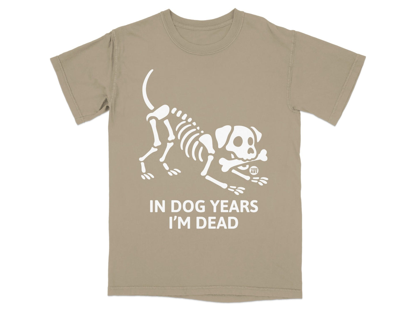 Tan t-shirt with white skeleton dog graphic and text "IN DOG YEARS I'M DEAD".