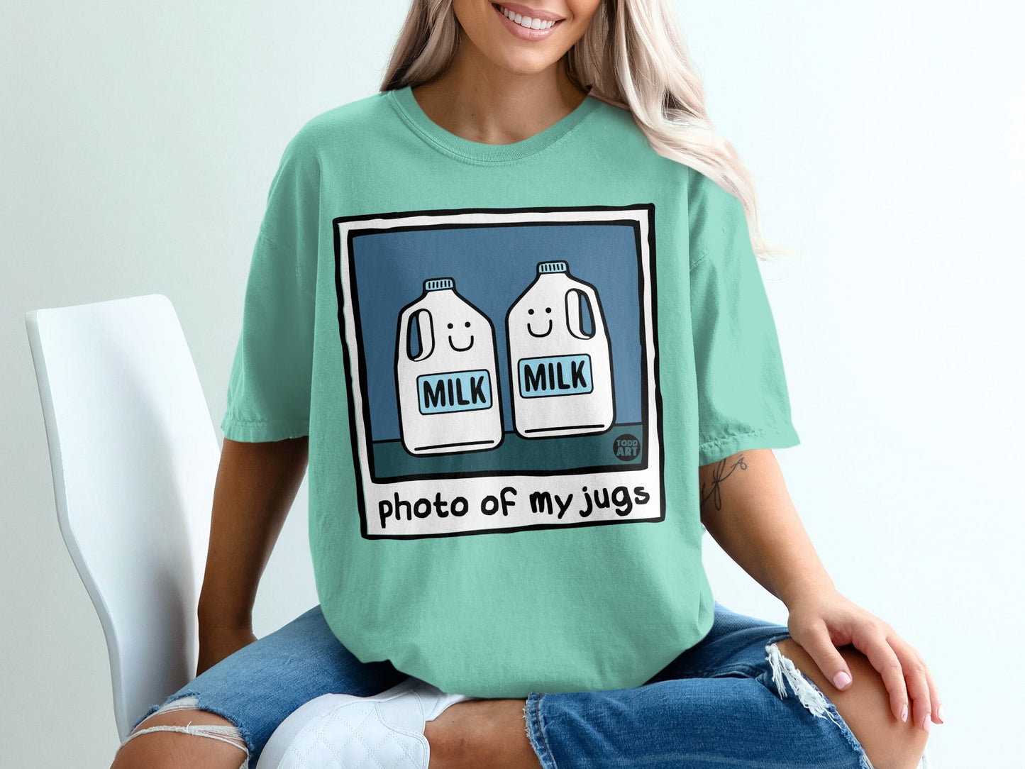 Two cartoon milk jugs with smiling faces, text "MILK" on each.