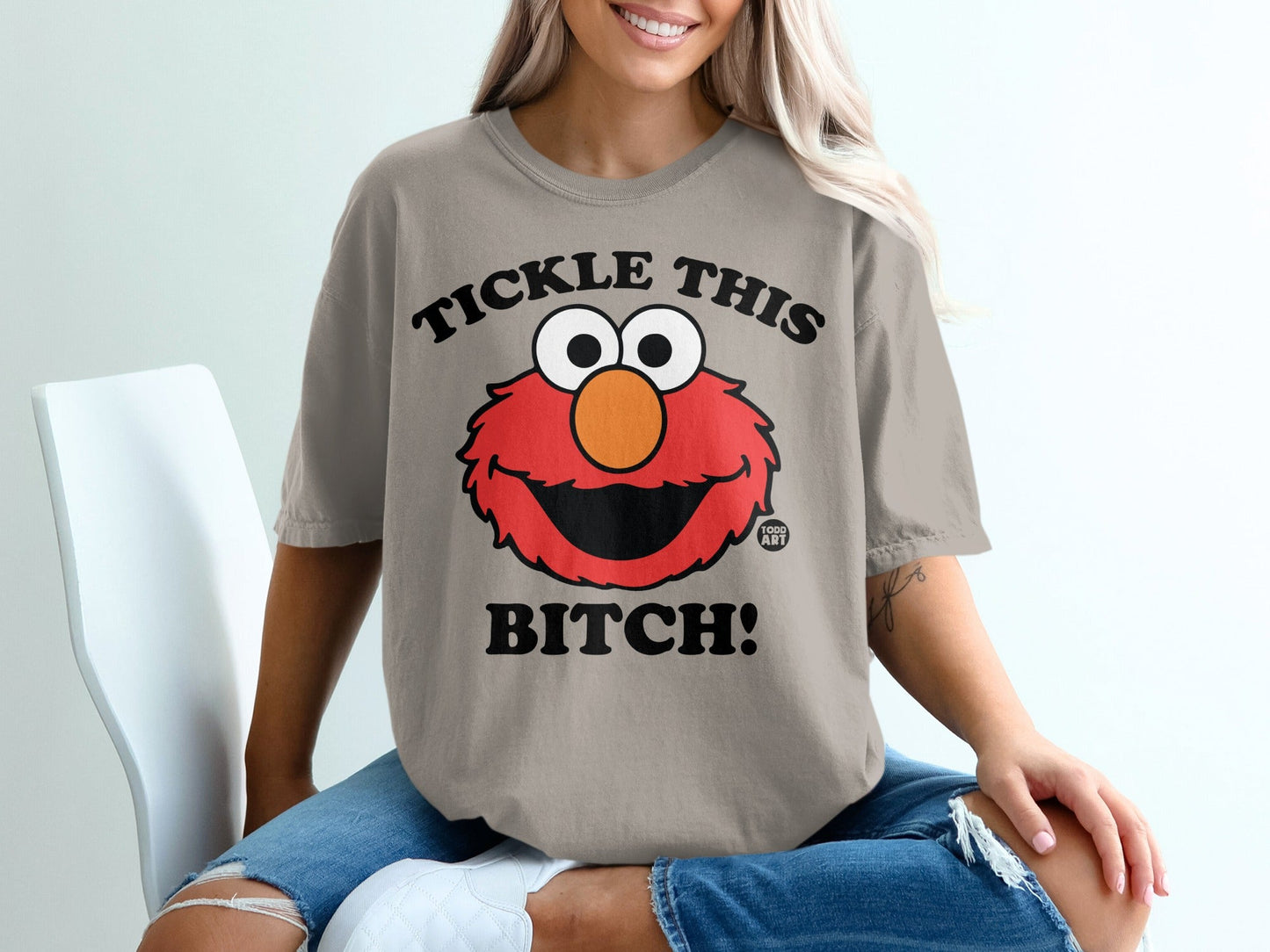 Elmo graphic t-shirt with text "Tickle this Bitch!"