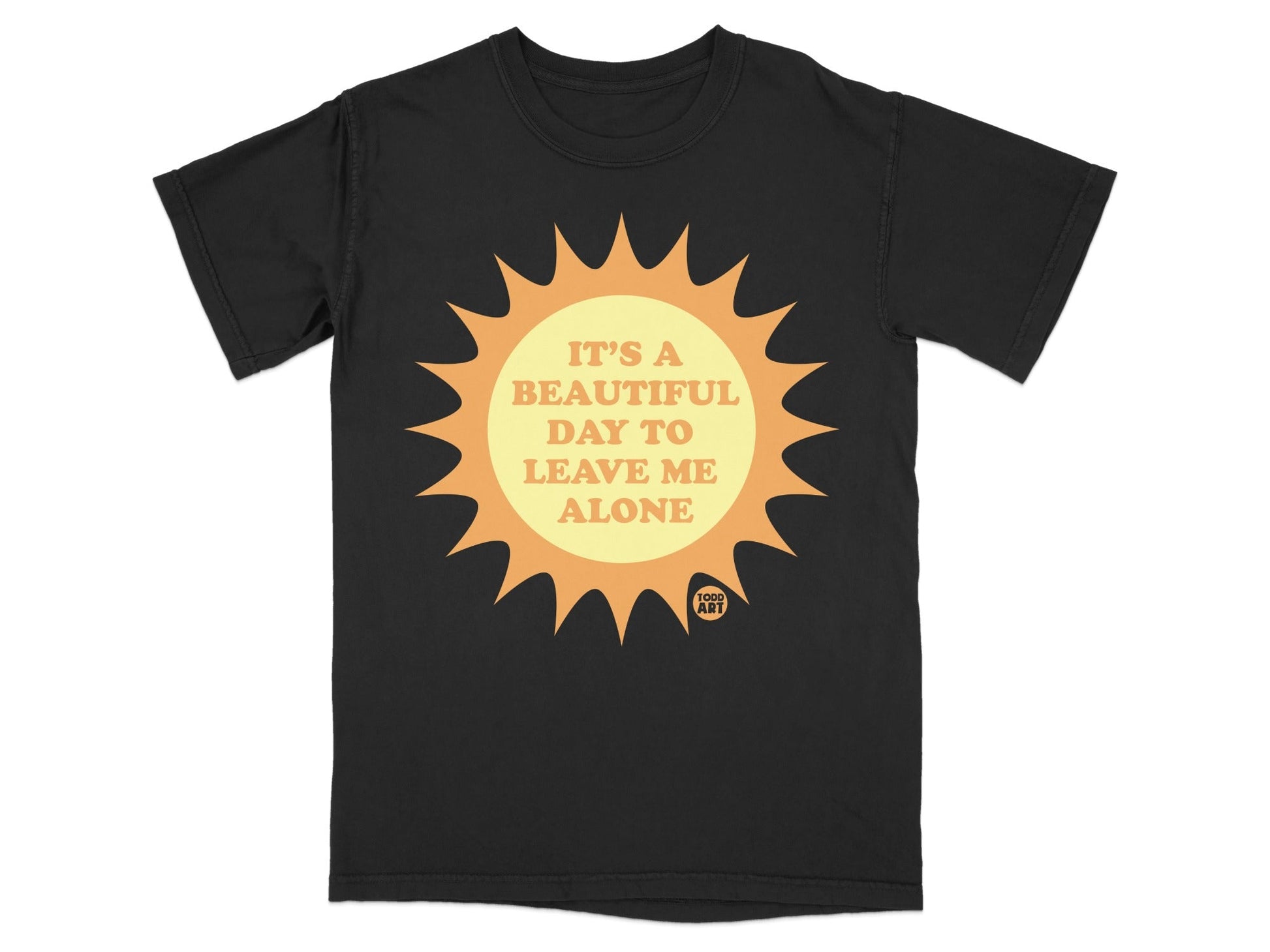 Black t-shirt with a sun graphic and text reading "IT'S A BEAUTIFUL DAY TO LEAVE ME ALONE."