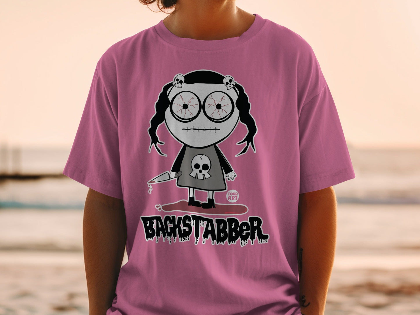 Backstabber Pink T-shirt with Skull and Knife Design
