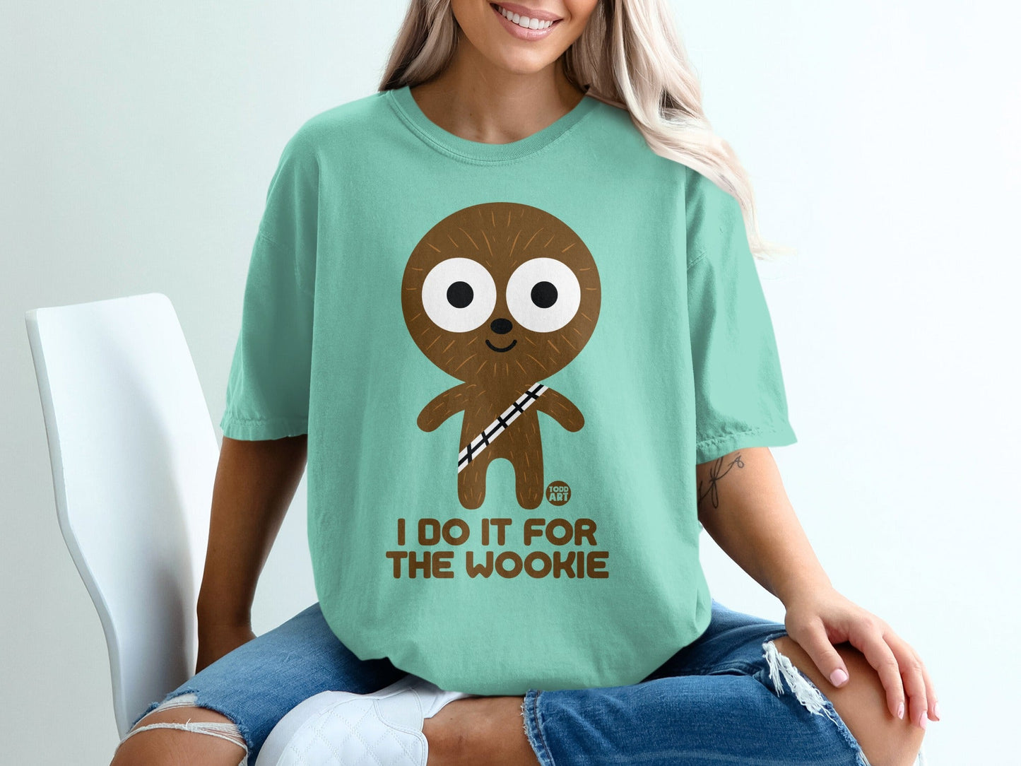 Teal t-shirt with cartoon Wookiee and text "I DO IT FOR THE WOOKIE".