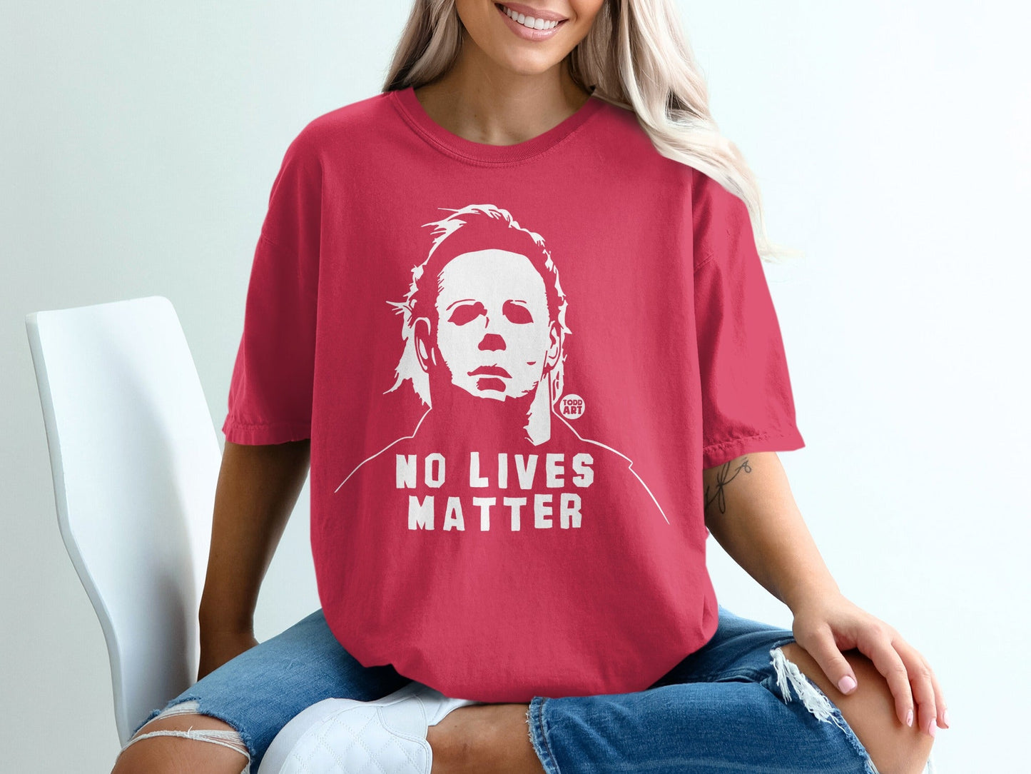 Red t-shirt with Michael Myers graphic and "NO LIVES MATTER" text.