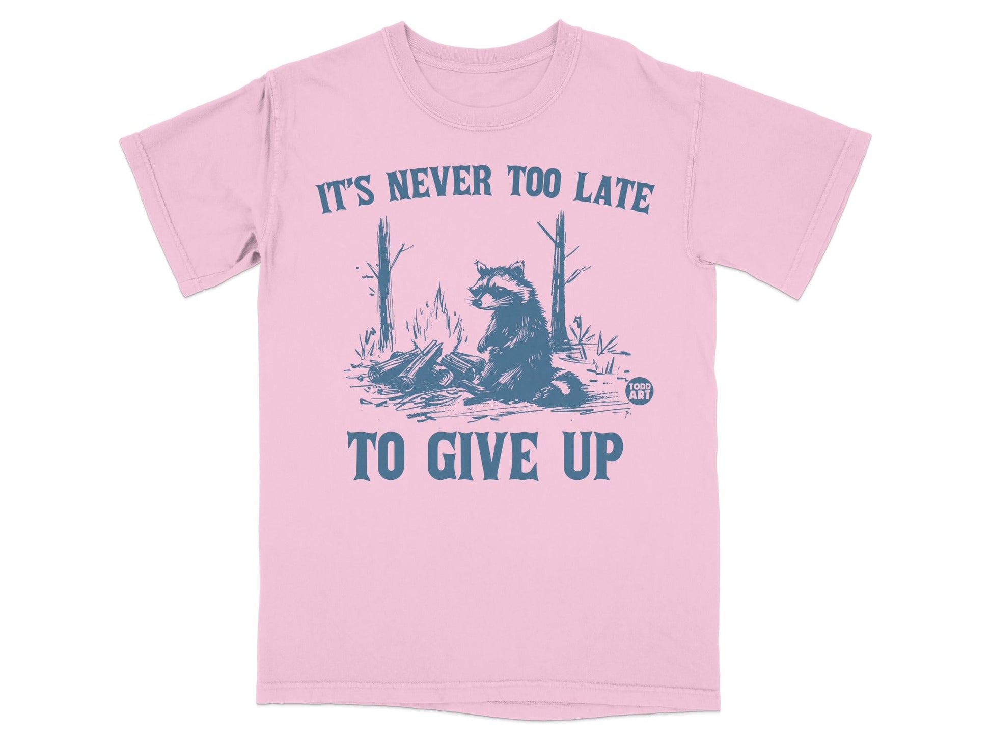 Pink t-shirt with blue text and raccoon graphic.