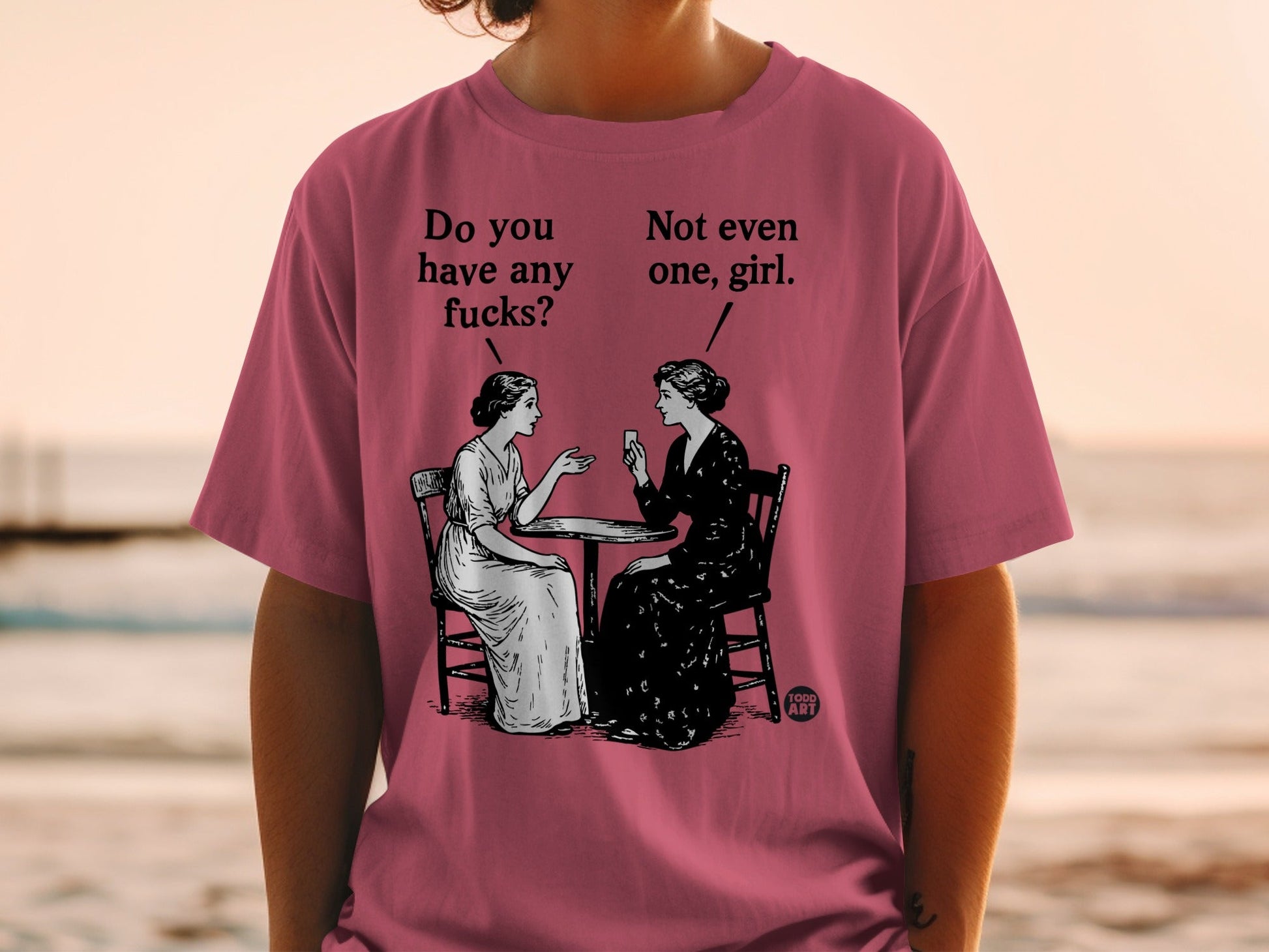 Two women sit at a table, one asks "Do you have any fucks?"