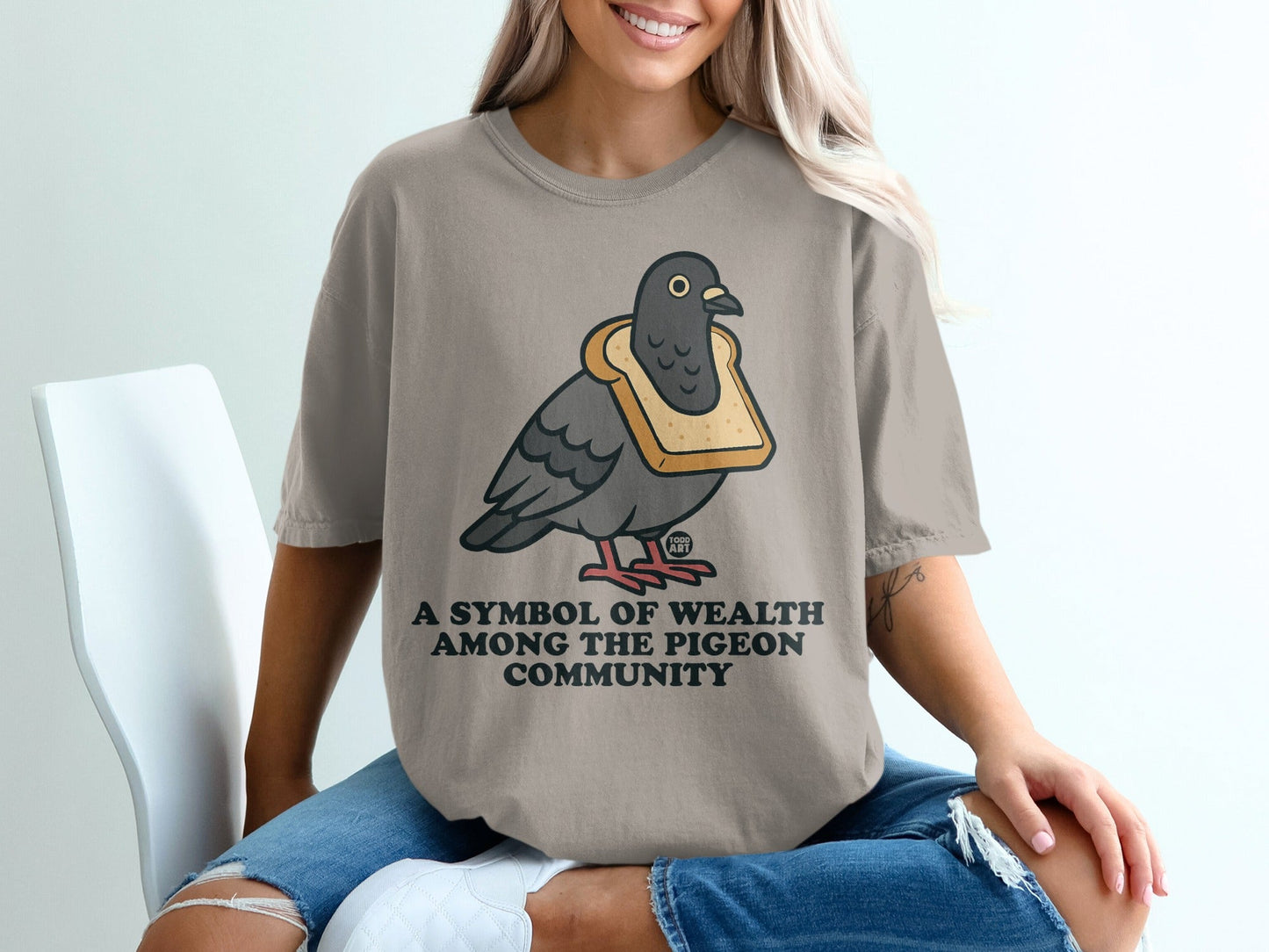 A Symbol of Wealth Pigeon Community T-shirt