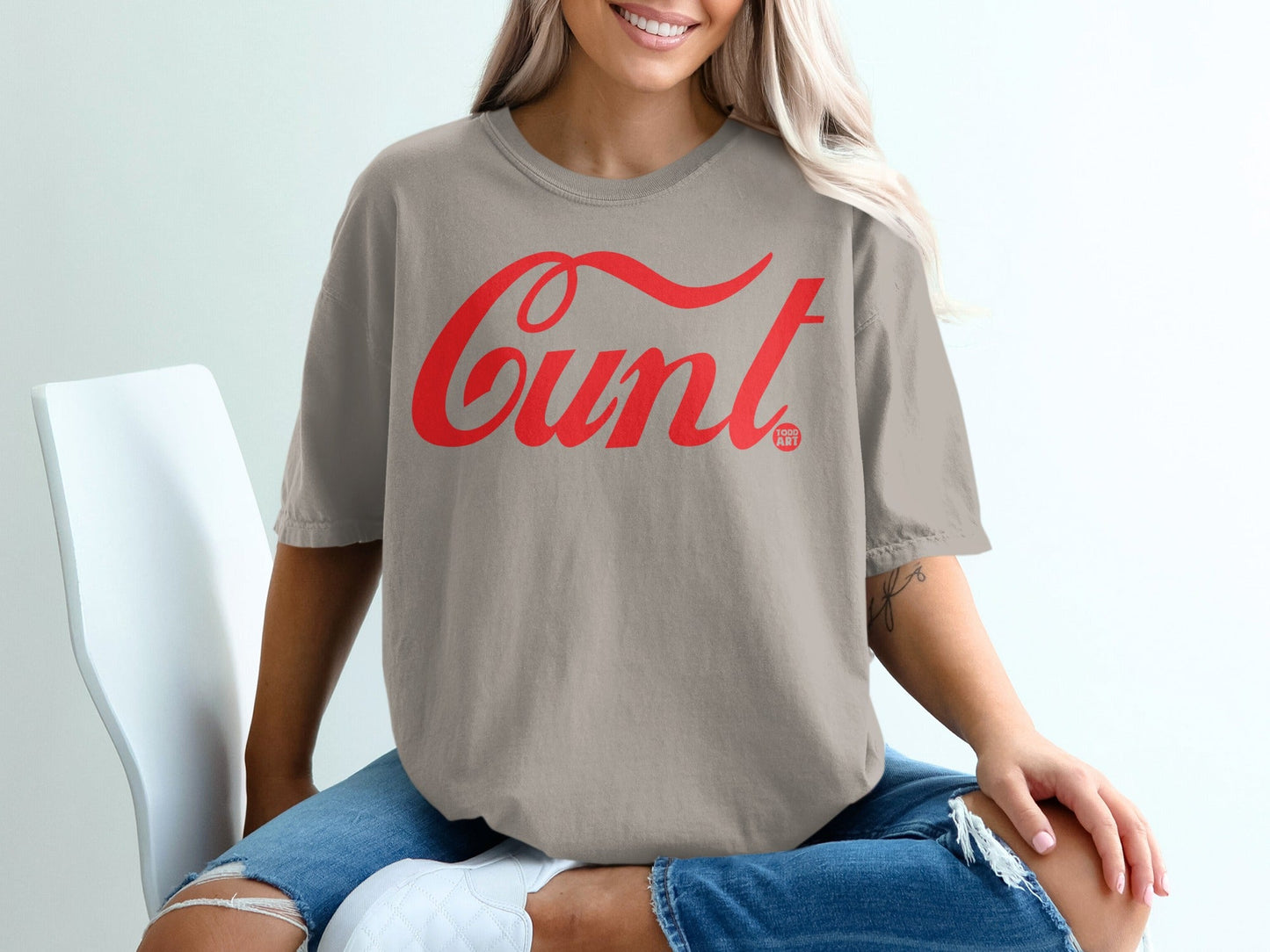 Stylish Gray Shirt with Bold Red Lettering Design