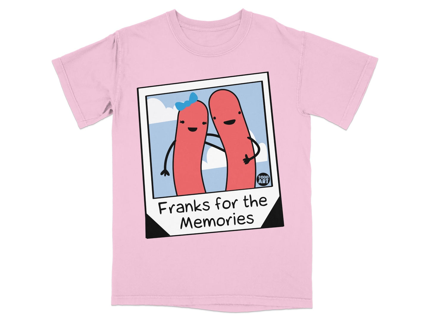 Pink t-shirt with a polaroid of two hot dogs saying "Franks for the Memories".