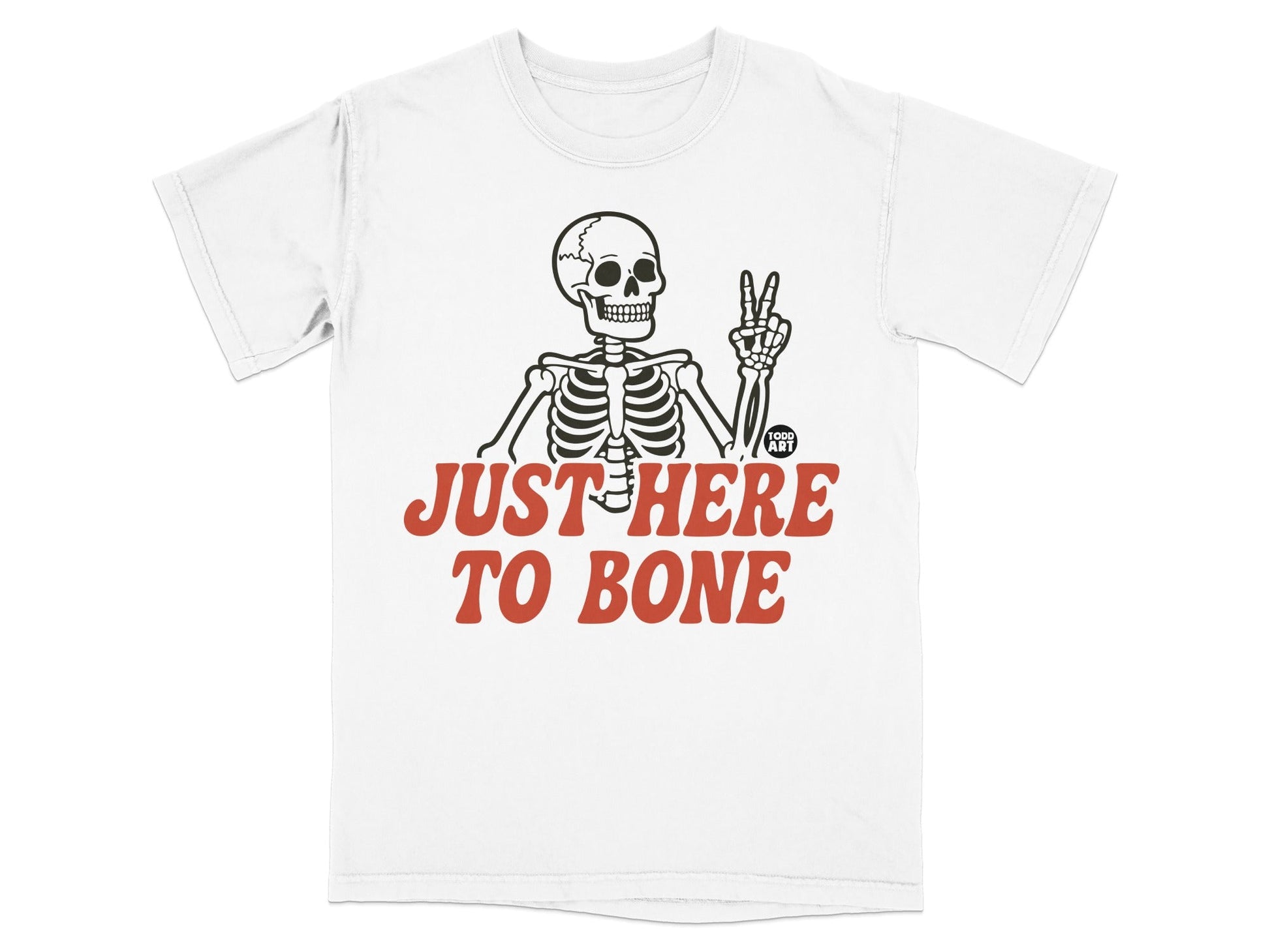 White t-shirt with "JUST HERE TO BONE" and a skeleton making peace sign.
