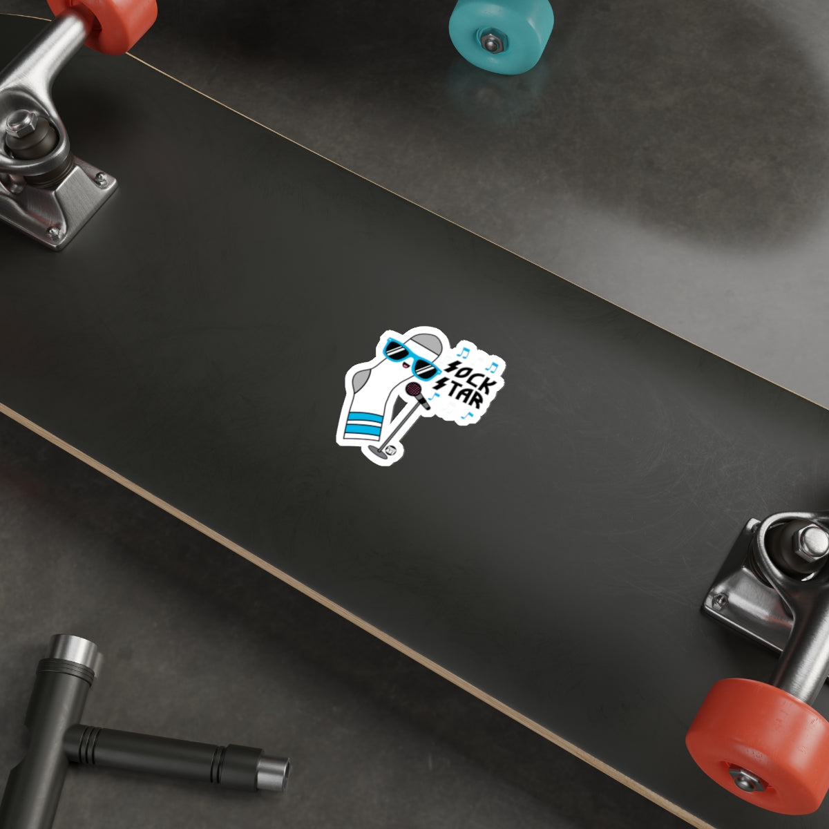 Sock Star Skateboard Sticker on Black Skateboard Deck'