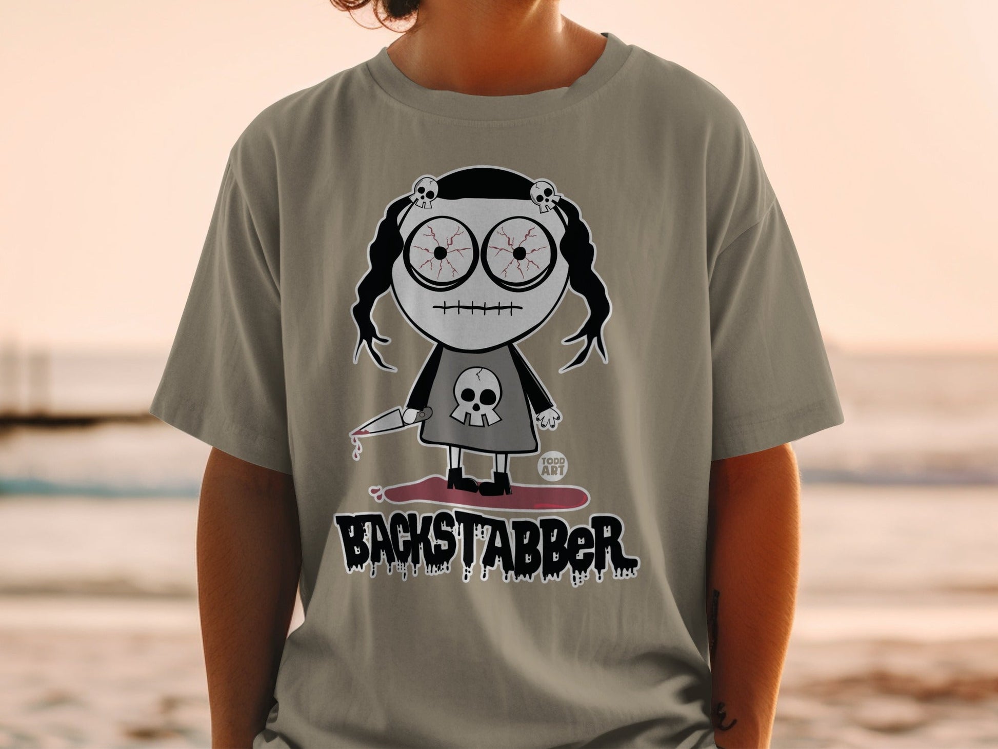 Backstabber Skull Doll Graphic Unisex T-shirt