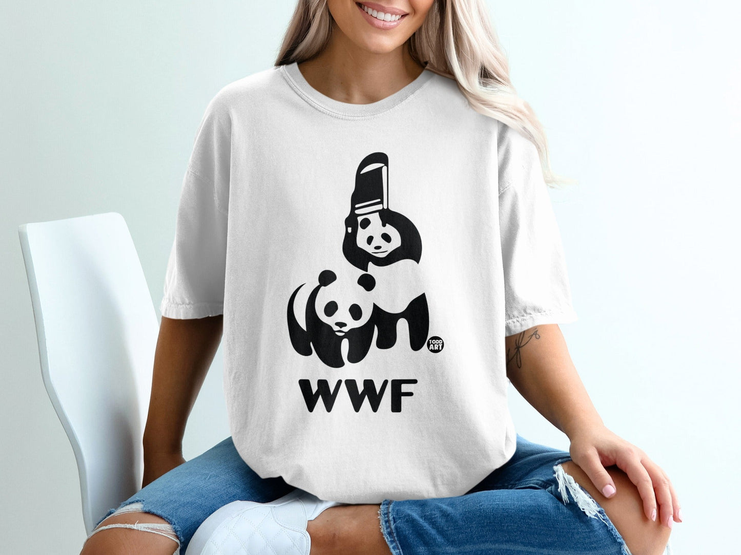 White t-shirt with WWF logo featuring two pandas and text.