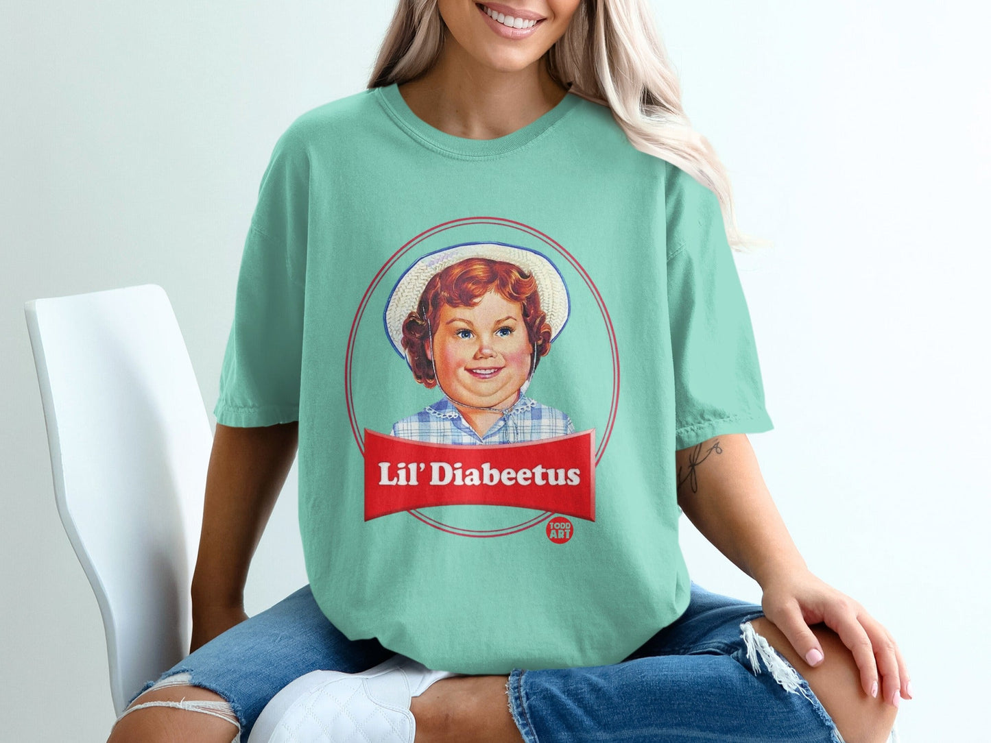 Teal t-shirt with "Lil' Diabeetus" text and a vintage child illustration.