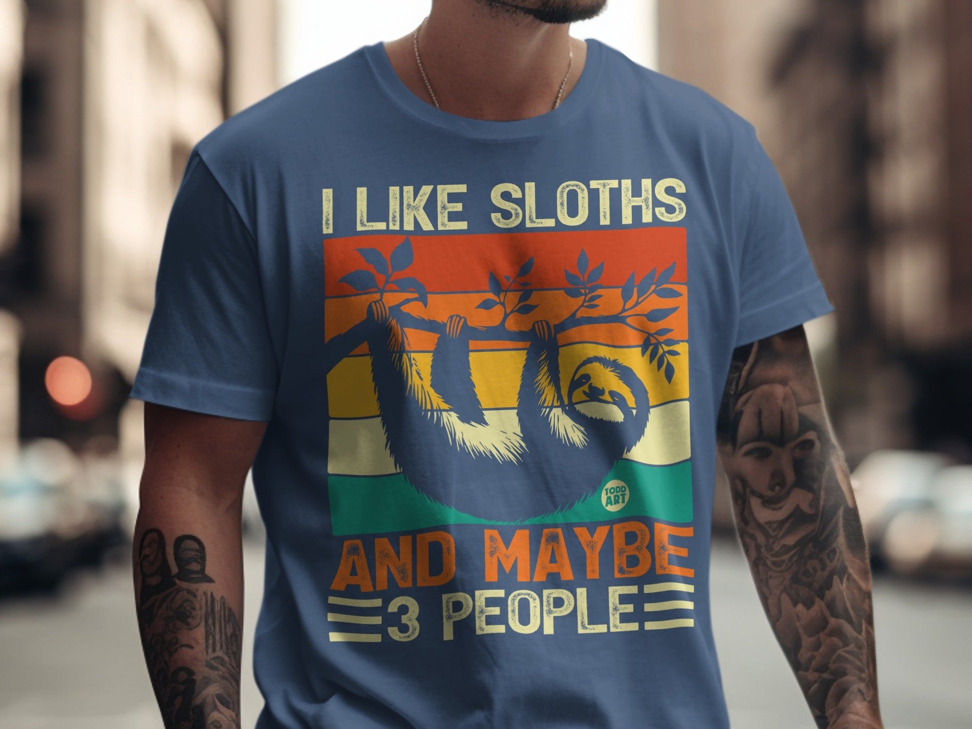 Blue t-shirt with sloth graphic and text "I Like Sloths And Maybe 3 People".