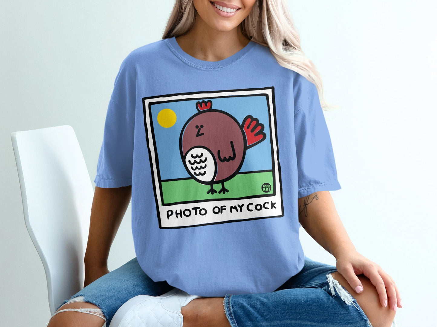 Blue t-shirt with cartoon chicken and "PHOTO OF MY COCK" text.