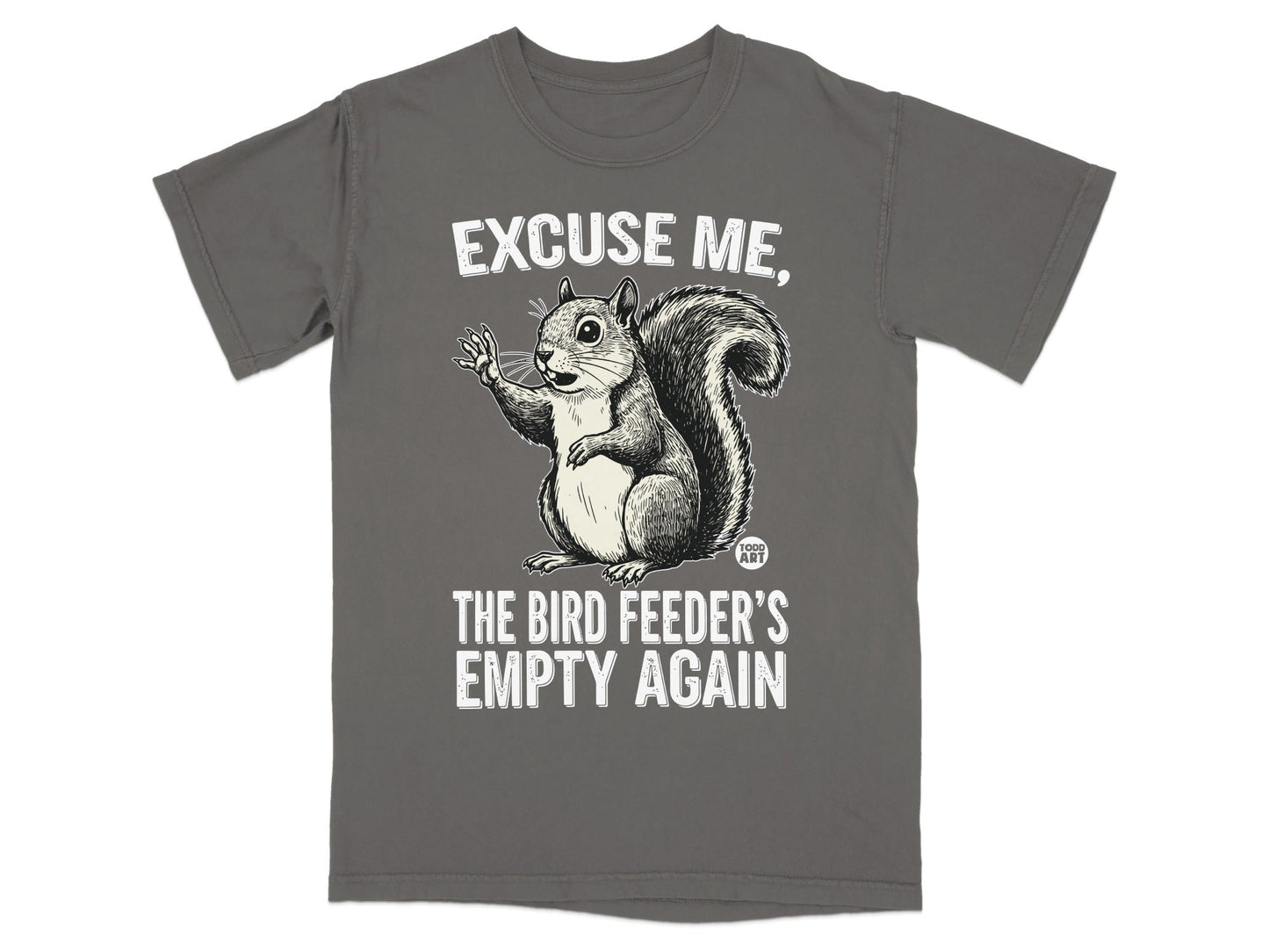 T-shirt with a squirrel saying "Excuse me, the bird feeder's empty again".