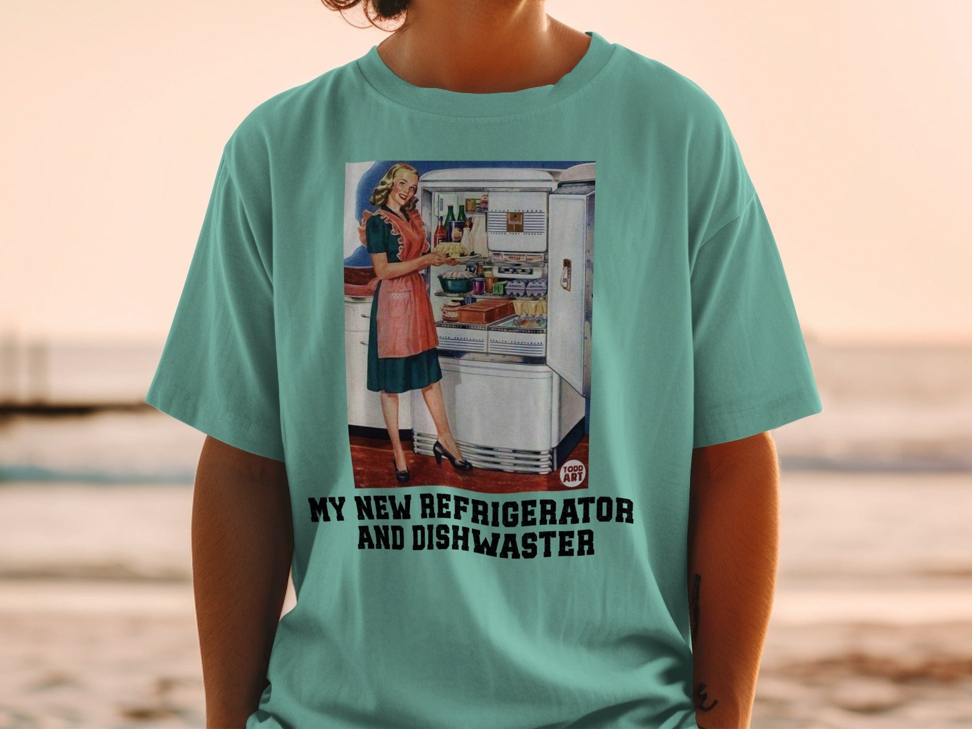 Woman wearing t-shirt with retro illustration of woman and refrigerator.