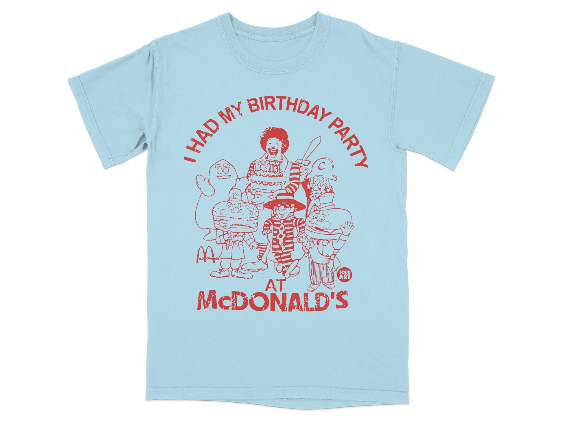 Light blue t-shirt with red graphic of McDonald's characters at a birthday party.