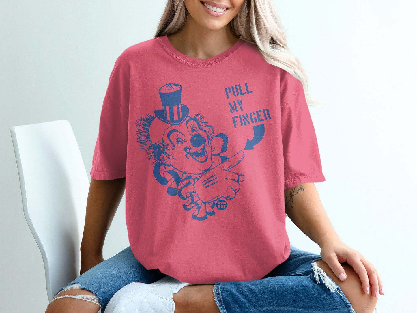 Humorous Clown PULL MY FINGER Graphic Pink product type