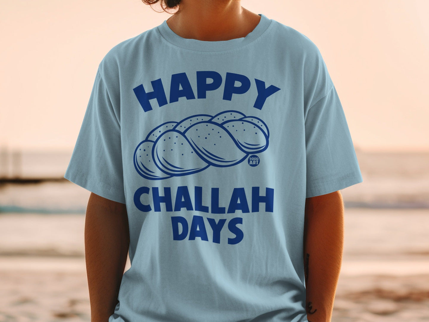 Light blue t-shirt with "Happy Challah Days" and challah bread illustration.