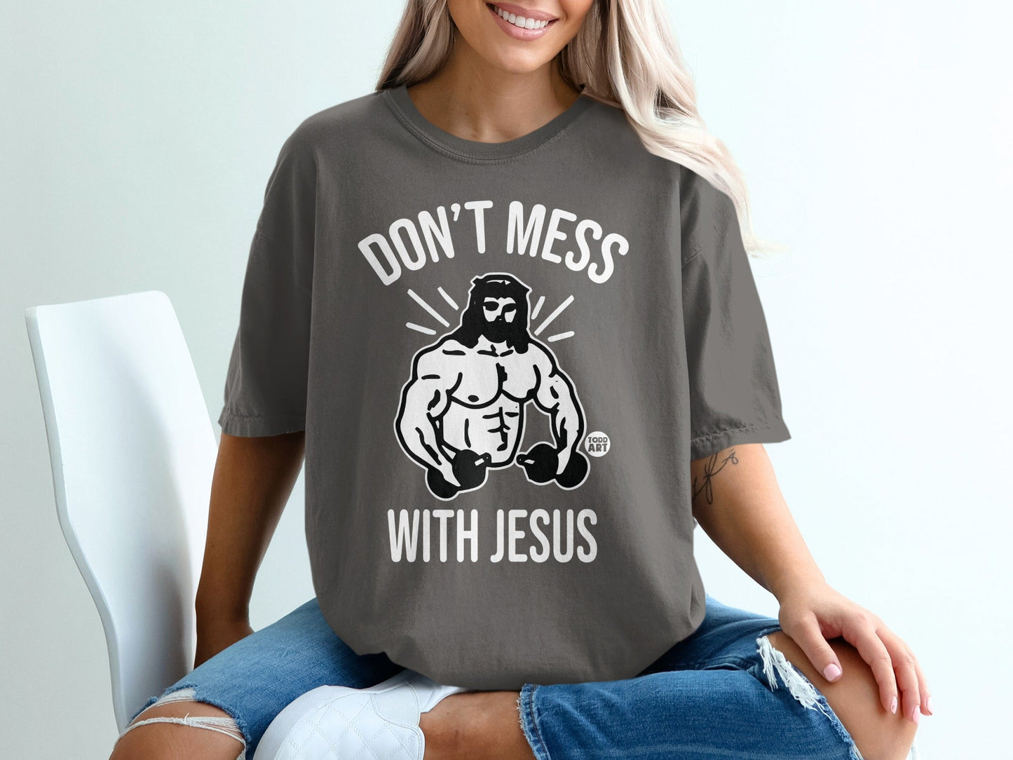 Grey t-shirt with "Don't Mess With Jesus" graphic featuring a muscular Jesus.