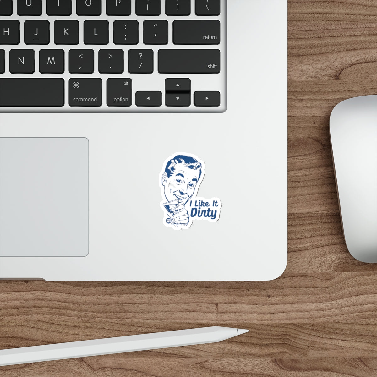 "I Like It Dirty" sticker of a man holding a martini on a laptop.