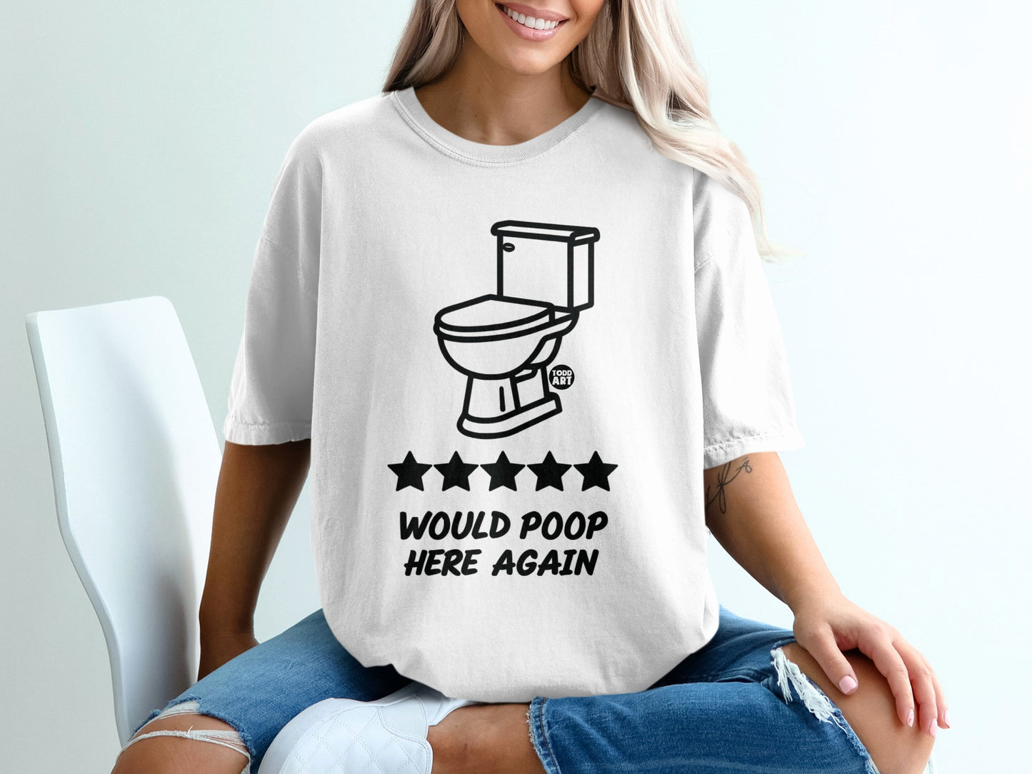 White t-shirt with toilet graphic and "Would poop here again" text.