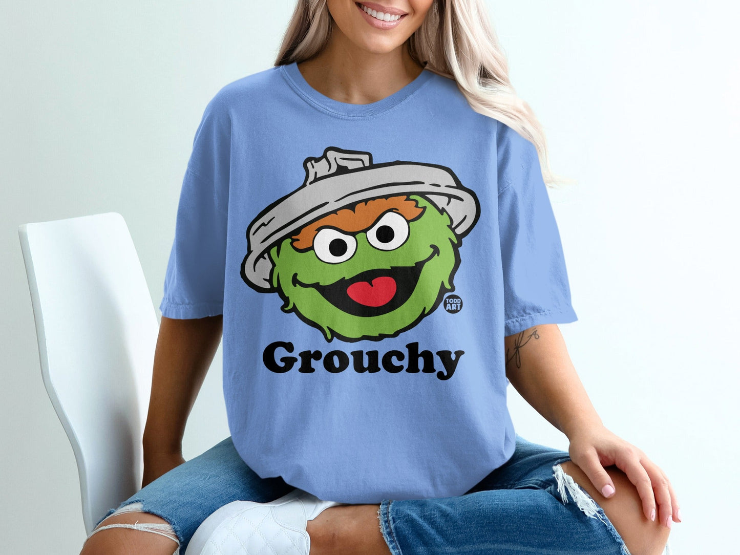 Grover from Sesame Street character with "Grouchy" text on a blue t-shirt.