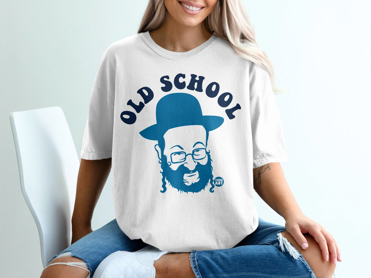 White t-shirt with blue "Old School" text and a cartoon drawing of a bearded man.