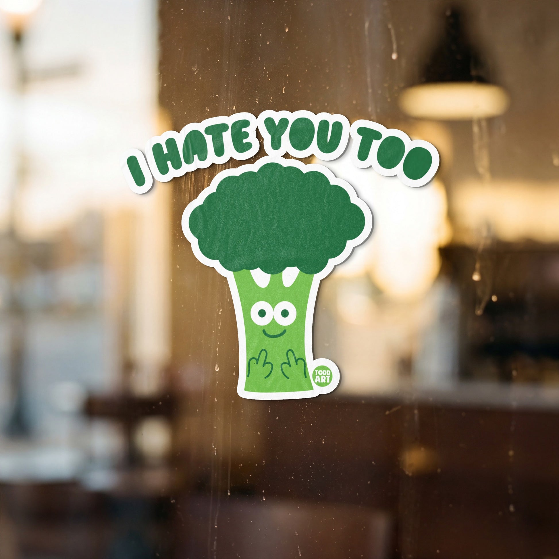 Broccoli sticker with "I HATE YOU TOO" text and middle finger hands.