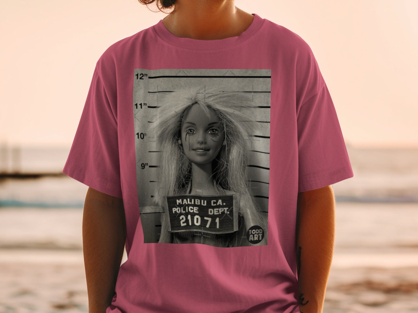 T-shirt with mugshot of a blonde woman, Malibu Police Dept. 21071.