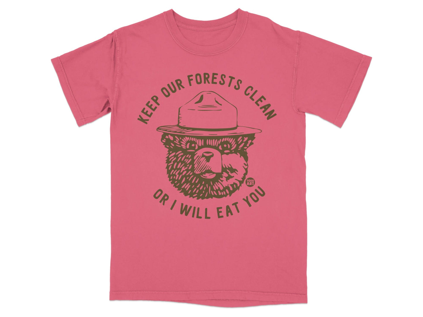 Keep Our Forests Clean or I Will Eat You graphic on a pink t-shirt.