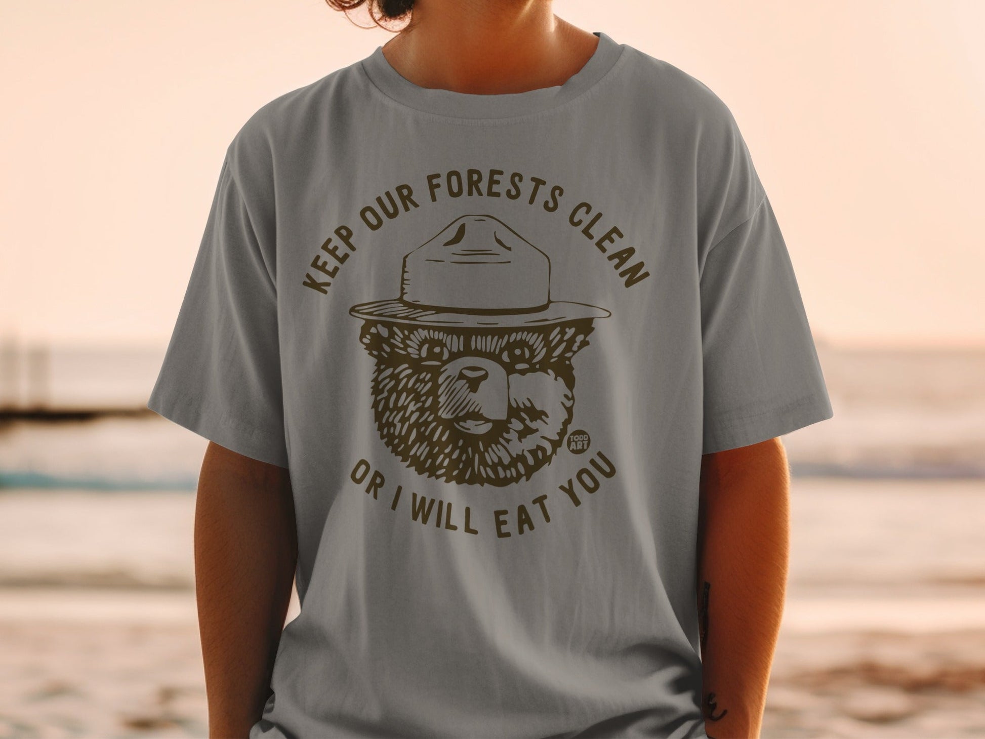 Smokey Bear graphic t-shirt with "Keep our forests clean or I will eat you."