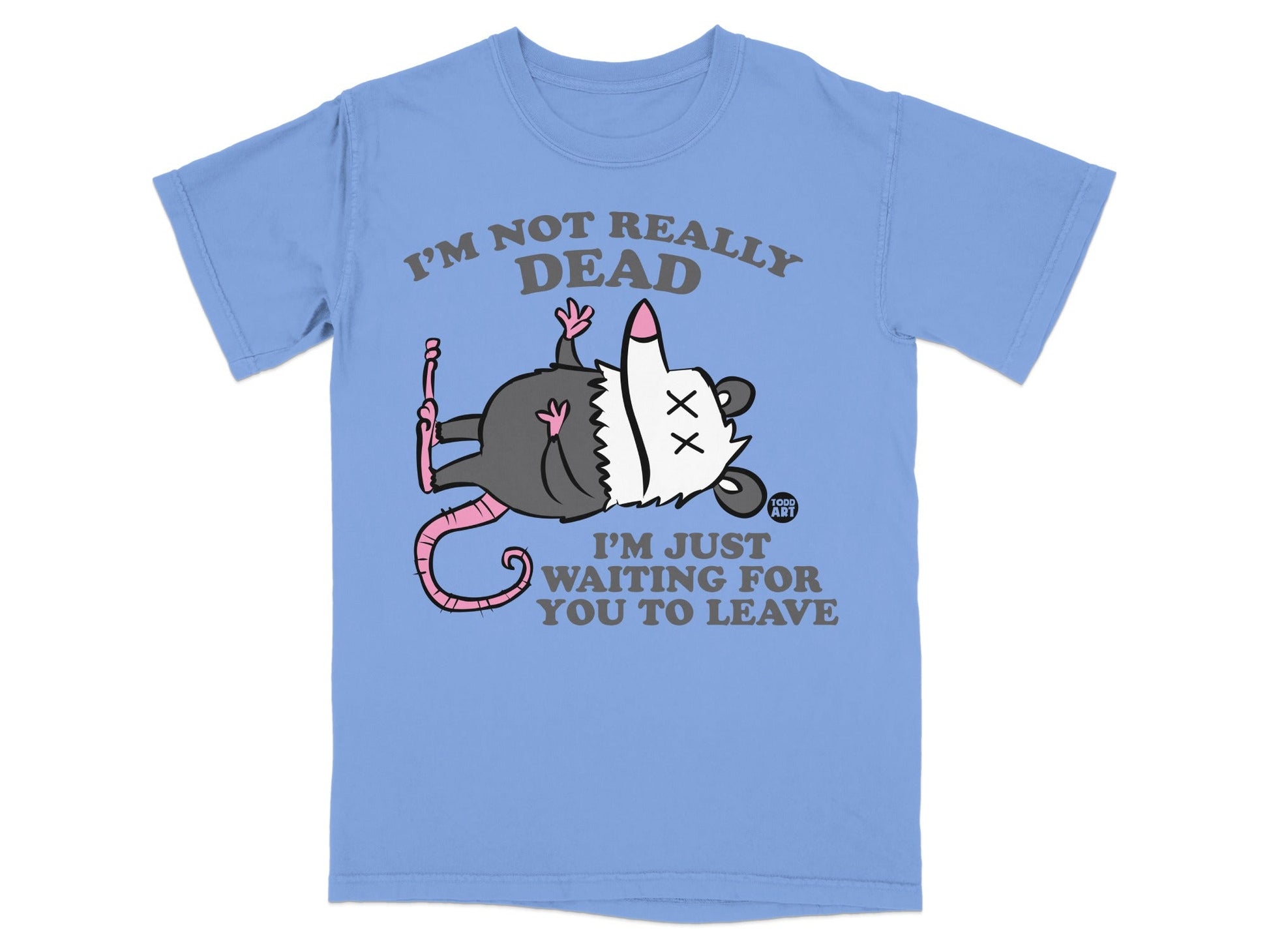 Light blue t-shirt with a possum playing dead, stating "I'm not really dead, I'm just waiting for you to leave."