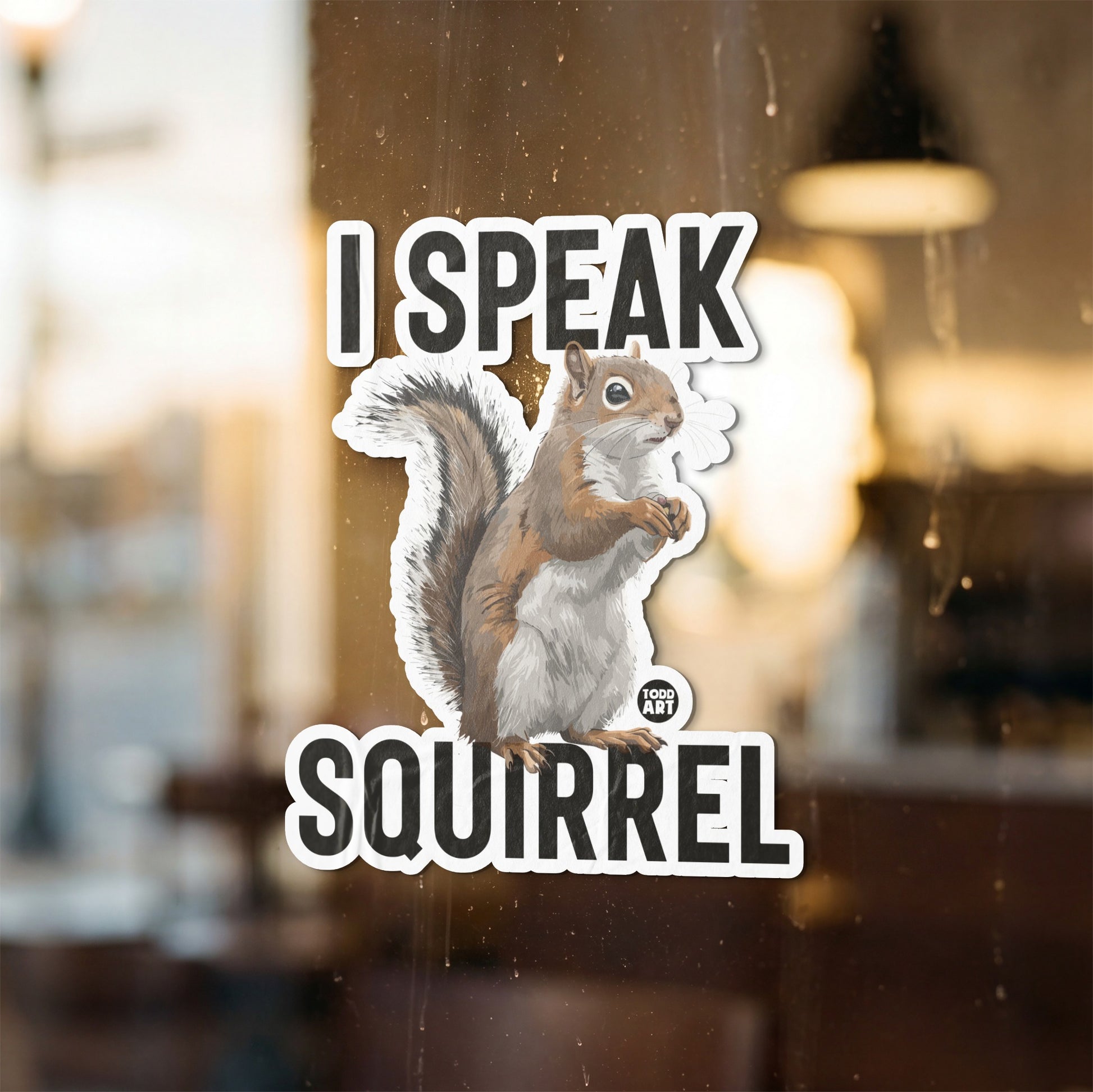 Sticker with text "I SPEAK SQUIRREL" and a painted squirrel graphic.