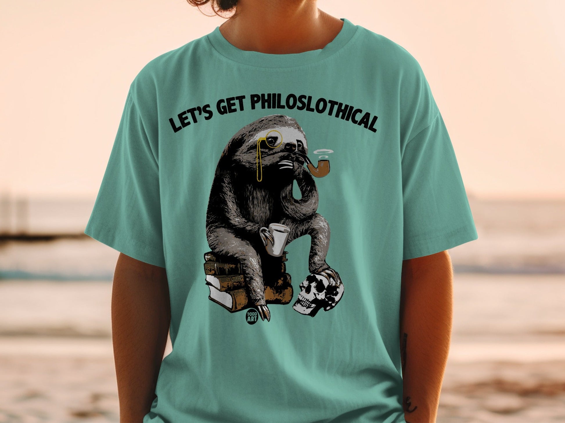 Sloth wearing monocle and smoking pipe, holding coffee mug, seated on books with skull.