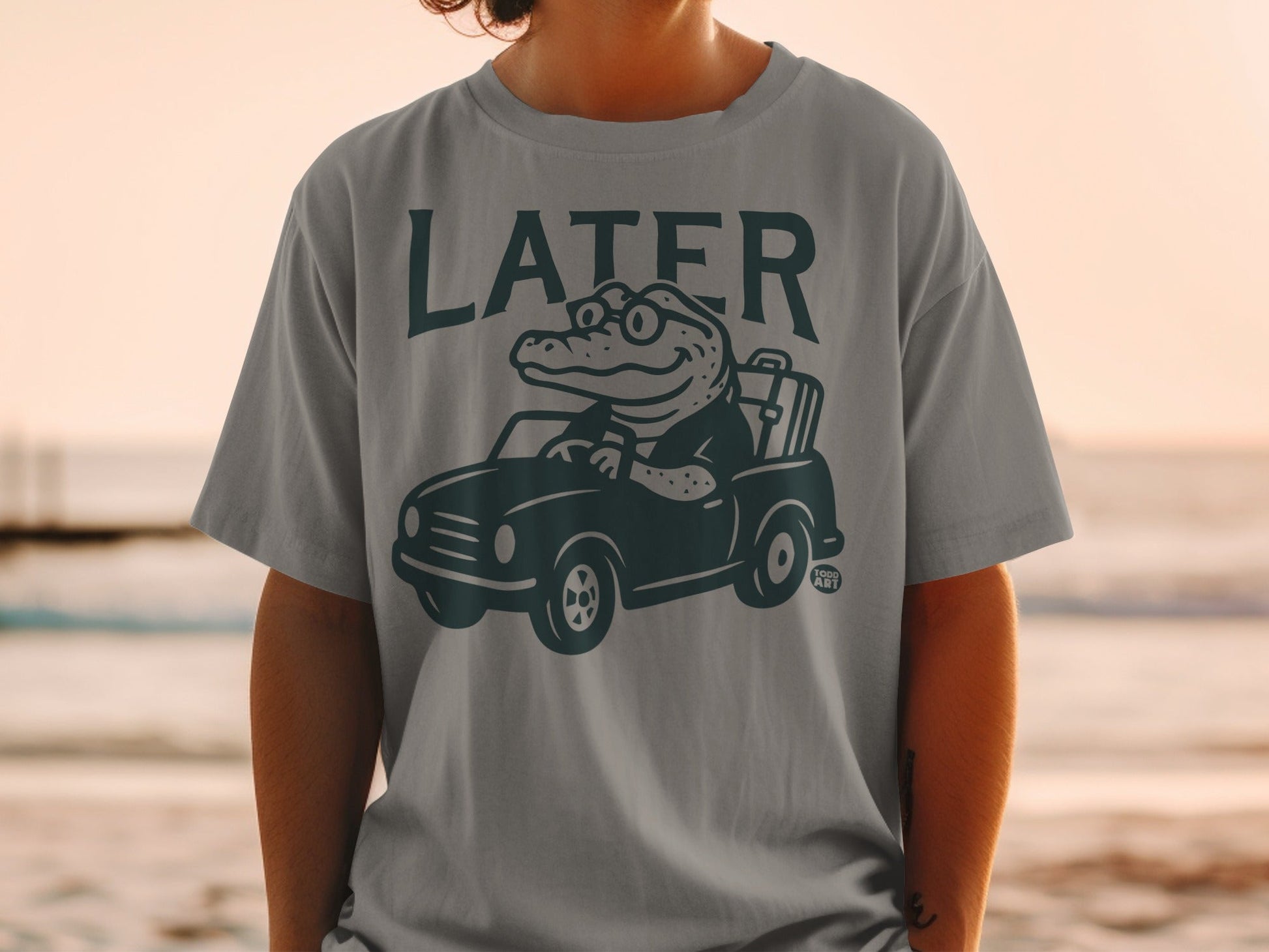 Cartoon alligator driving a car with suitcase, wearing sunglasses and shirt.